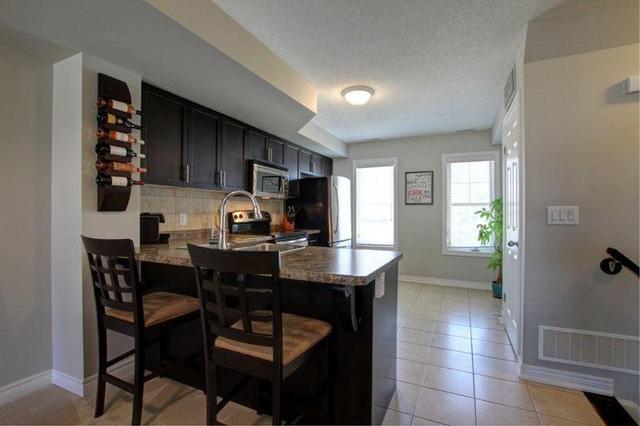 70 - 1380 Costigan Rd, Townhouse with 2 bedrooms, 3 bathrooms and 1 parking in Milton ON | Image 2