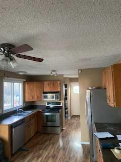403 4 Street, House detached with 3 bedrooms, 2 bathrooms and 4 parking in McLennan AB | Image 3