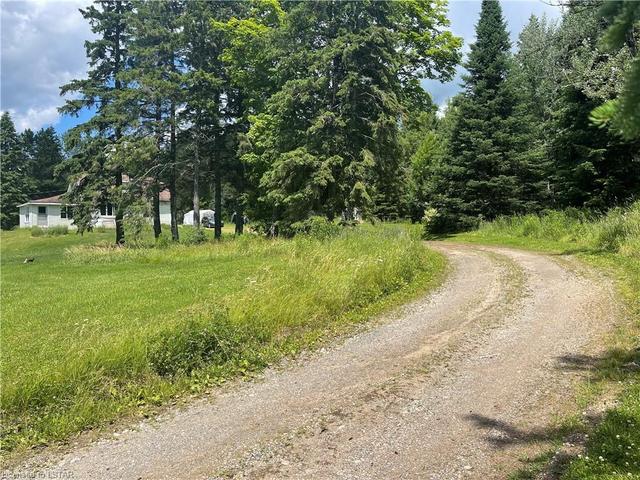 2442 Highway 520, House detached with 4 bedrooms, 2 bathrooms and 10 parking in Magnetawan ON | Image 4