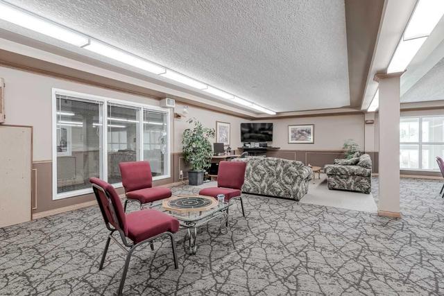 121 - 6868 Sierra Morena Boulevard Sw, Condo with 2 bedrooms, 1 bathrooms and 1 parking in Calgary AB | Image 31