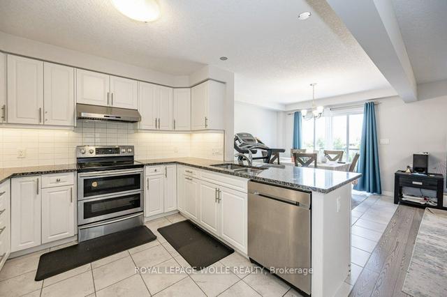 a - 606 Montpellier Dr, House semidetached with 4 bedrooms, 3 bathrooms and 2 parking in Waterloo ON | Image 28