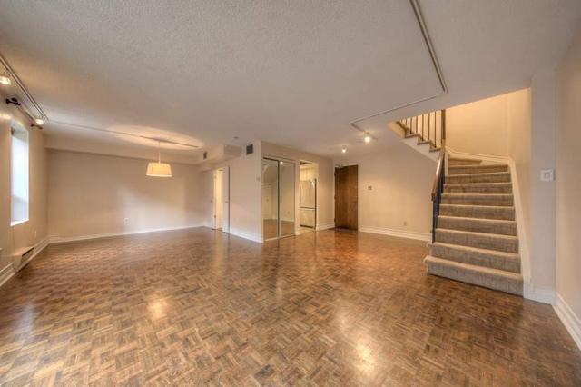 203 - 19 Dundonald St, Condo with 2 bedrooms, 2 bathrooms and 1 parking in Toronto ON | Image 23