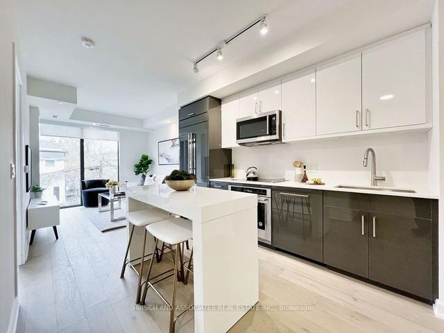 407 - 840 St. Clair Ave W, Condo with 2 bedrooms, 2 bathrooms and 1 parking in Toronto ON | Image 2