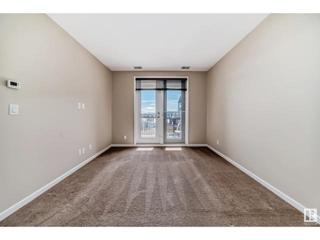 310 - 6083 Maynard Wy Nw, Condo with 1 bedrooms, 1 bathrooms and 2 parking in Edmonton AB | Image 16