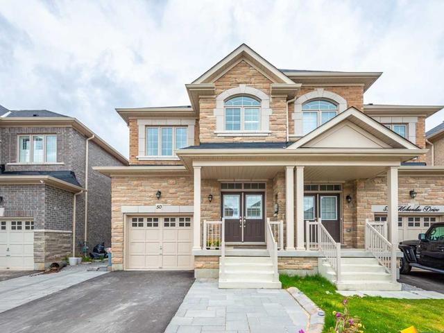 50 Mohandas Dr, House semidetached with 4 bedrooms, 5 bathrooms and 3 parking in Markham ON | Image 1