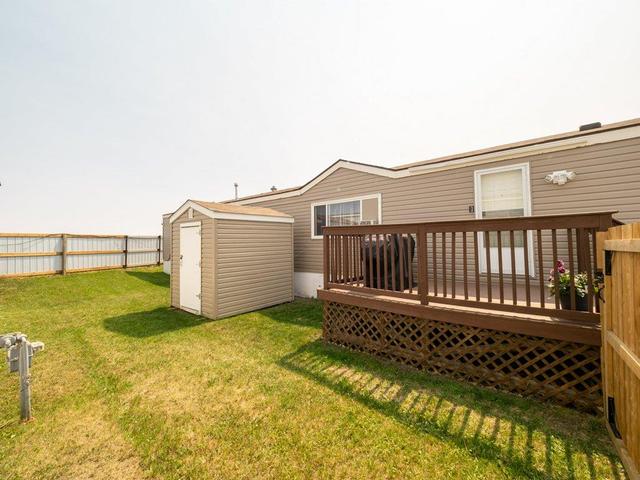 66 - 2715 Westside Drive W, Home with 3 bedrooms, 2 bathrooms and 2 parking in Lethbridge AB | Image 30