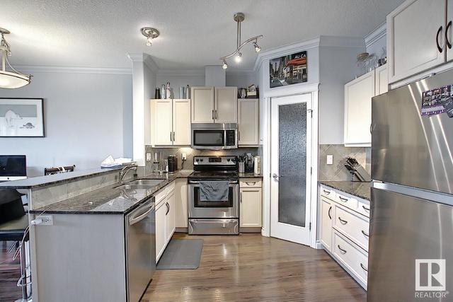 246 - 10121 80 Av Nw, Condo with 2 bedrooms, 2 bathrooms and 2 parking in Edmonton AB | Image 11