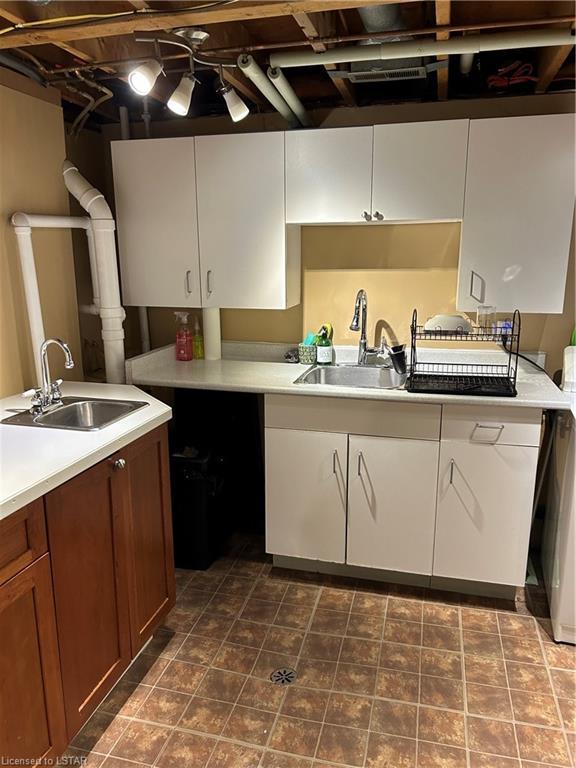 Kitchen laundry in basement | Image 25
