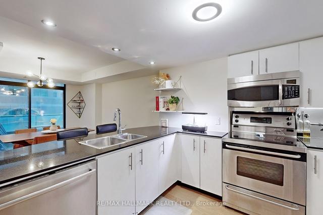 302 - 105 Victoria St, Condo with 2 bedrooms, 2 bathrooms and 1 parking in Toronto ON | Image 2