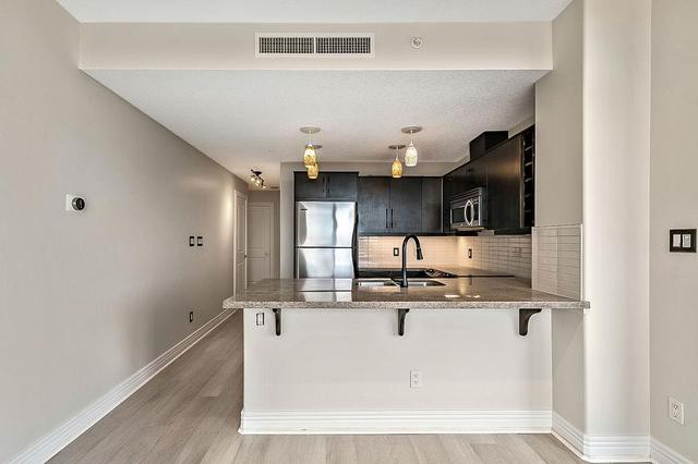 1607 - 55 Spruce Place Sw, Condo with 2 bedrooms, 2 bathrooms and 2 parking in Calgary AB | Image 4