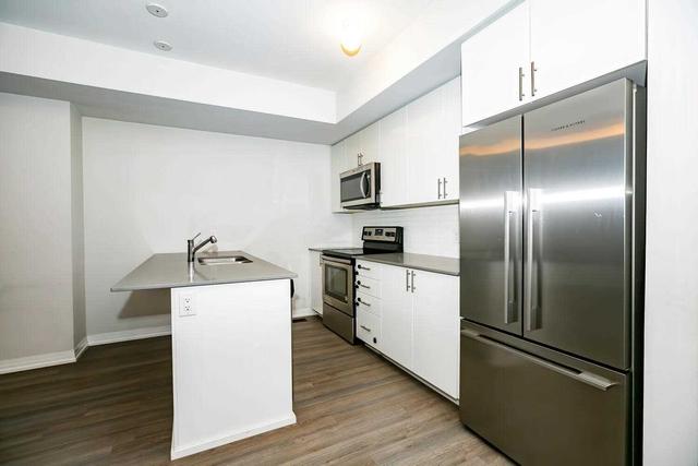 101 - 1206 Main St E, Townhouse with 2 bedrooms, 3 bathrooms and 1 parking in Milton ON | Image 14
