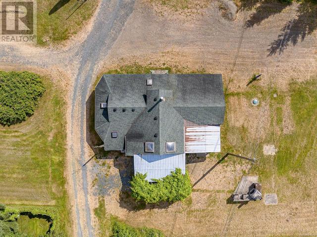 8185 Island Hwy S, House detached with 4 bedrooms, 4 bathrooms and 6 parking in Comox Valley A BC | Image 42