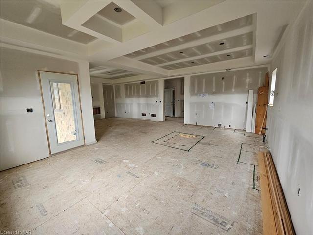 View of Kitchen and living room from dining area. | Image 7