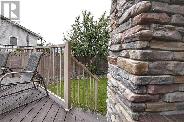 101 Grizzly Terrace N, House detached with 5 bedrooms, 3 bathrooms and 4 parking in Lethbridge AB | Image 39