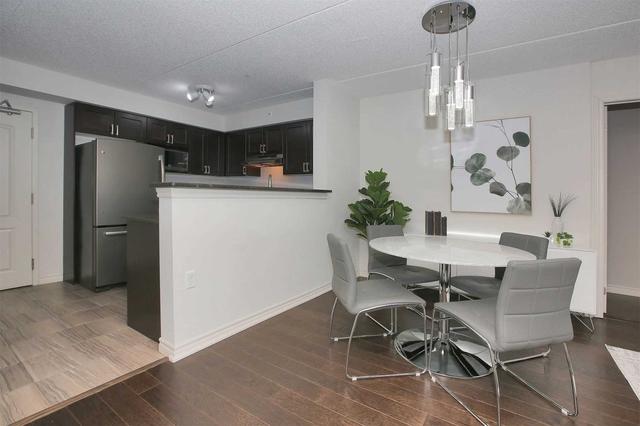 203 - 1470 Main St E, Condo with 2 bedrooms, 1 bathrooms and 2 parking in Milton ON | Image 3
