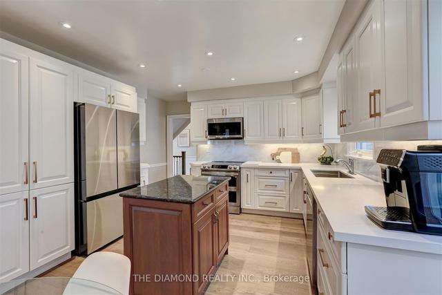 65 Pettit Dr, House detached with 4 bedrooms, 4 bathrooms and 4 parking in Toronto ON | Image 3