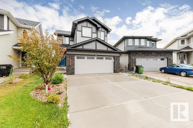 497 Conroy Cr Sw, House detached with 3 bedrooms, 2 bathrooms and 4 parking in Edmonton AB | Card Image