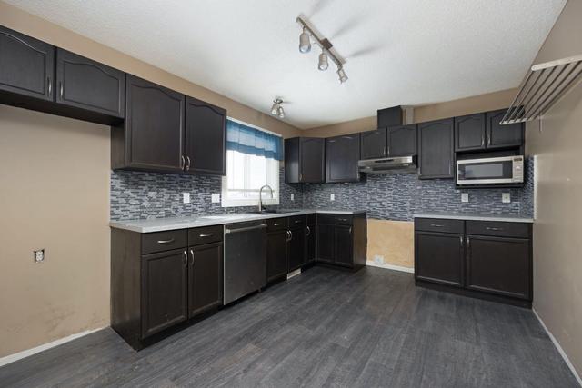16 - 101 Langevin Road, Home with 3 bedrooms, 2 bathrooms and 2 parking in Wood Buffalo AB | Image 9
