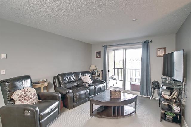8314 - 304 Mackenzie Way Sw, Condo with 2 bedrooms, 2 bathrooms and 2 parking in Calgary AB | Image 25