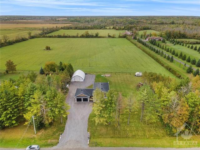 710 Mcfarlane Road, House detached with 3 bedrooms, 2 bathrooms and 8 parking in North Grenville ON | Image 3