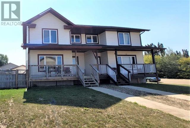 5909 53 Avenue, House semidetached with 4 bedrooms, 3 bathrooms and 2 parking in Stettler AB | Image 1