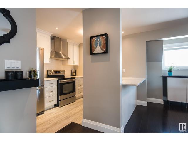 5979 40 Av Nw, House attached with 2 bedrooms, 1 bathrooms and null parking in Edmonton AB | Image 2