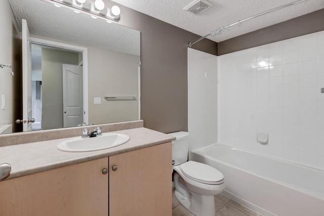 7204 - 304 Mackenzie Way Sw, Condo with 2 bedrooms, 1 bathrooms and 1 parking in Calgary AB | Image 22