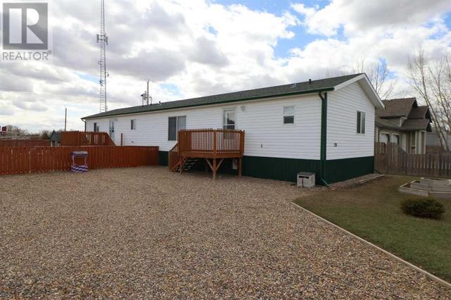 720 2 Street N, House other with 3 bedrooms, 2 bathrooms and 4 parking in Taber MD AB | Image 1