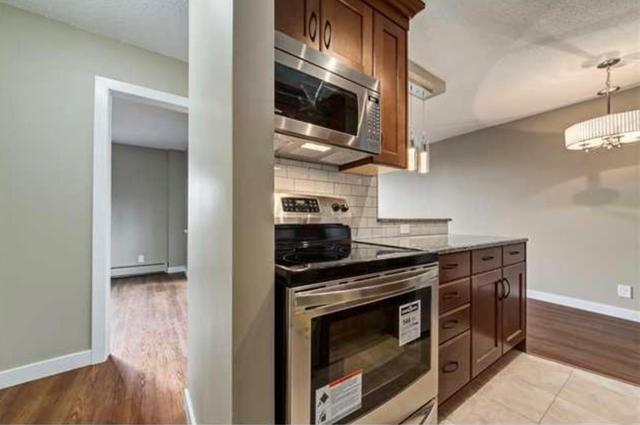303 - 507 57 Avenue Sw, Condo with 1 bedrooms, 1 bathrooms and 1 parking in Calgary AB | Image 2