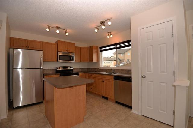 1065 Panatella Boulevard Nw, House detached with 3 bedrooms, 1 bathrooms and 2 parking in Calgary AB | Image 4