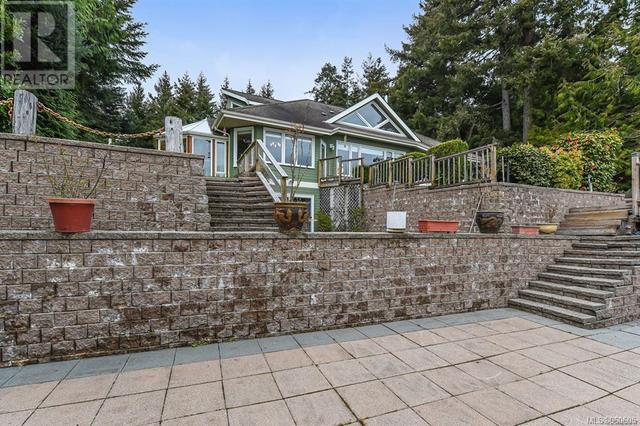 7602 Ships Point Rd, House detached with 3 bedrooms, 3 bathrooms and 6 parking in Comox Valley A BC | Image 23