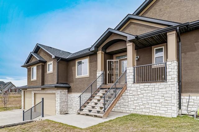 258016 Eden Park View W, House detached with 4 bedrooms, 2 bathrooms and 10 parking in Foothills County AB | Image 3