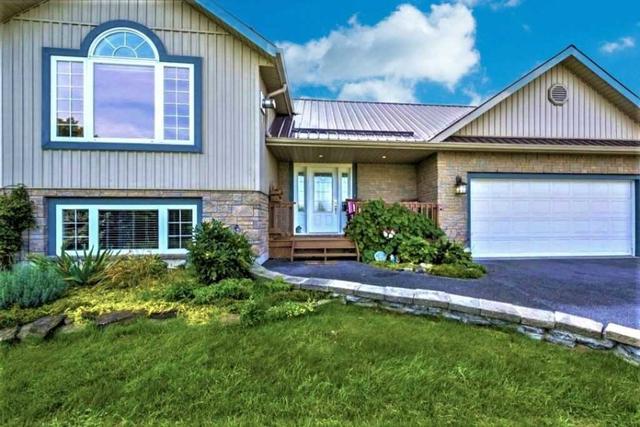 102 Glenora Estates Rd, House detached with 2 bedrooms, 3 bathrooms and 7 parking in Prince Edward County ON | Image 1