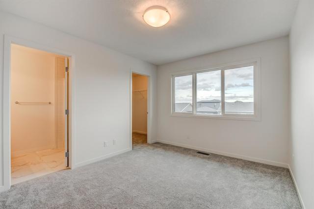 52 Edith Gate Nw, Home with 3 bedrooms, 2 bathrooms and 2 parking in Calgary AB | Image 28