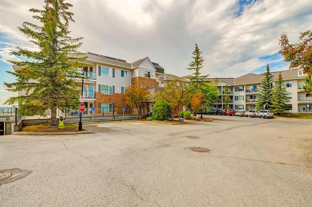 1304 - 950 Arbour Lake Road Nw, Condo with 2 bedrooms, 2 bathrooms and 1 parking in Calgary AB | Image 2