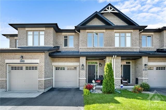 213 Butterfly Walk, Townhouse with 3 bedrooms, 3 bathrooms and 3 parking in Ottawa ON | Image 1