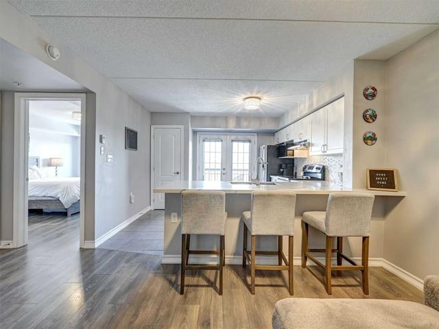 309 - 1470 Main St E, Condo with 1 bedrooms, 1 bathrooms and 1 parking in Milton ON | Image 2
