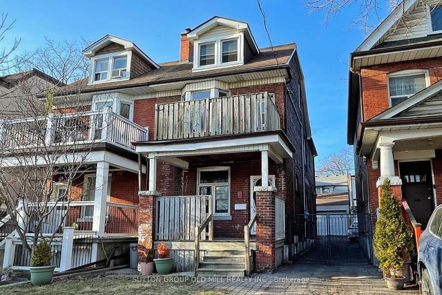 18 Springhurst Ave, House semidetached with 5 bedrooms, 2 bathrooms and 2 parking in Toronto ON | Image 1