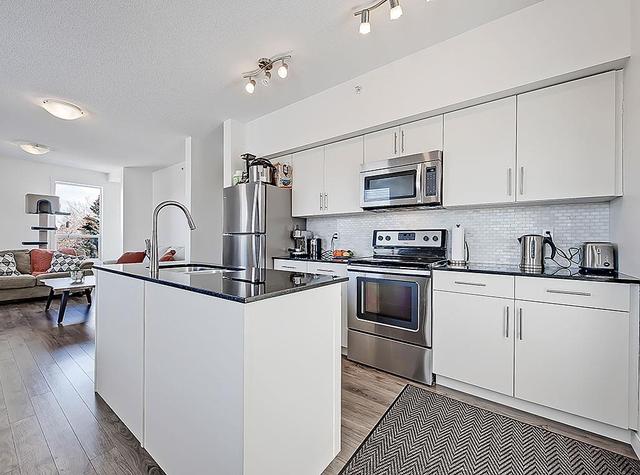 401 - 1740 9th Street Nw, Condo with 2 bedrooms, 1 bathrooms and 1 parking in Calgary AB | Image 9