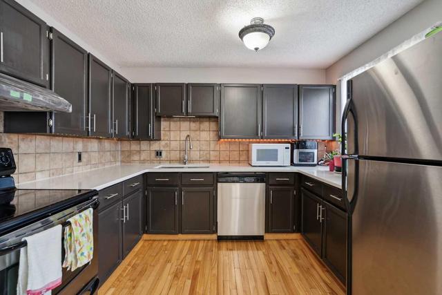 56 - 23 Glamis Drive Sw, Home with 3 bedrooms, 2 bathrooms and 2 parking in Calgary AB | Image 7