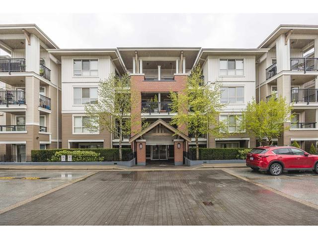 e305 - 8929 202 Street, Condo with 2 bedrooms, 2 bathrooms and 1 parking in Langley BC | Card Image