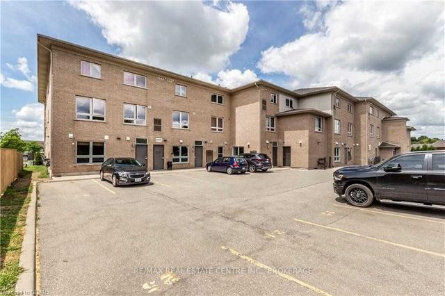 202 - 904 Paisley Rd, Townhouse with 2 bedrooms, 2 bathrooms and 1 parking in Guelph ON | Image 21