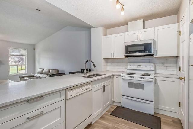 38 Tararidge Circle Ne, Home with 2 bedrooms, 2 bathrooms and 2 parking in Calgary AB | Image 13