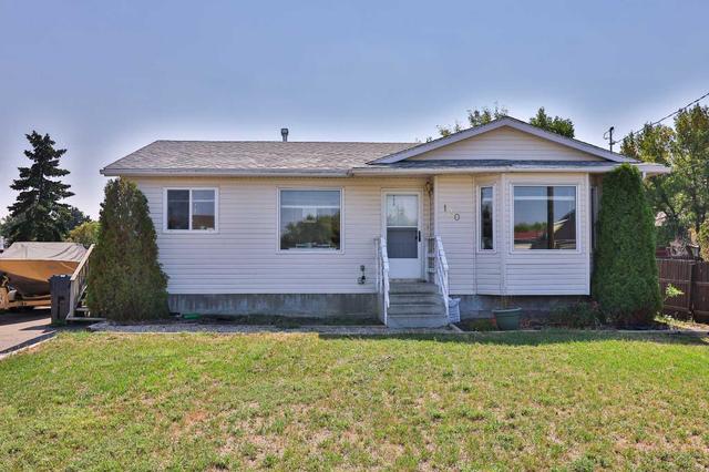 130 e 400 N, House detached with 5 bedrooms, 2 bathrooms and 4 parking in Raymond AB | Image 1