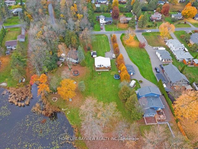 206 Lakeshore Dr E, House detached with 3 bedrooms, 1 bathrooms and 6 parking in Kawartha Lakes ON | Image 33