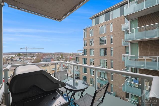 Balcony Views are spectacular. Covered balcony to enjoy all year around.  Enjoy a morning coffee or sip a cocktail and enjoy gorgeous sunsets. BBQ is Gas with hook up. | Image 6