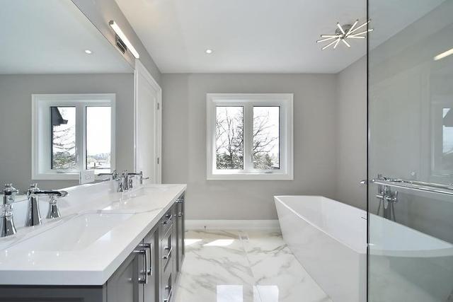 95 Falstaff Ave, House detached with 4 bedrooms, 5 bathrooms and 6 parking in Toronto ON | Image 9