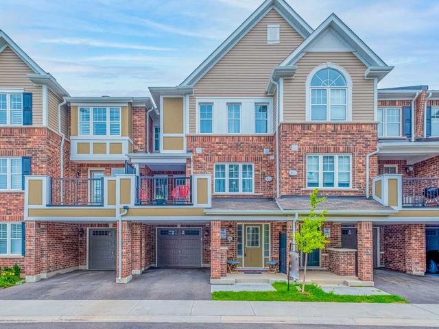 54 - 1222 Rose Way, Townhouse with 3 bedrooms, 3 bathrooms and 2 parking in Milton ON | Image 1