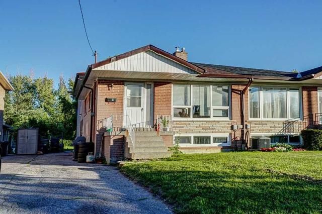 21 Syracuse Cres, House semidetached with 4 bedrooms, 2 bathrooms and 3 parking in Toronto ON | Image 1