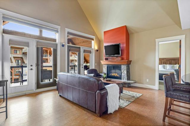 401 - 191 Kananaskis Way, Condo with 2 bedrooms, 2 bathrooms and 1 parking in Canmore AB | Image 2